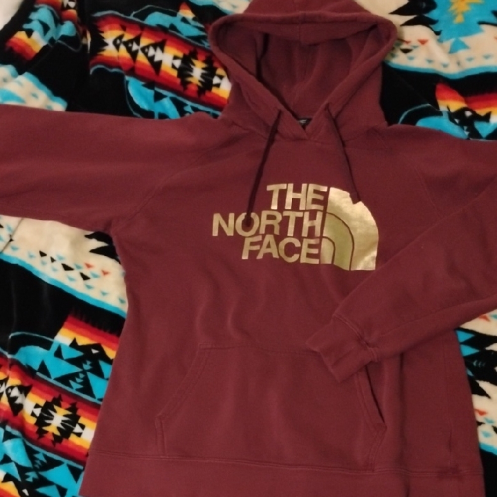 The North Face Burgundy Hoodie with Gold Emblem